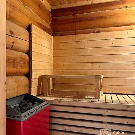 Cozy Log In In Out And Sauna Holiday home